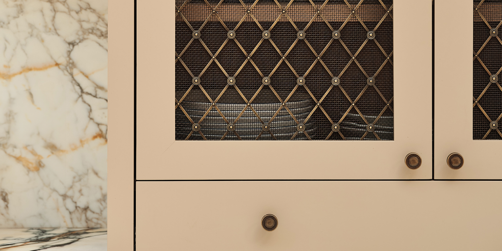 Design by Laura Butler-Madden | Photography by Patrick Butler-Madden | Regency Diamond Grille shown in our antique brass lacquered (ABL) finish.