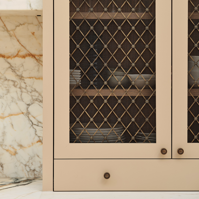 Design by Laura Butler-Madden | Photography by Patrick Butler-Madden | Regency Diamond Grille shown in our antique brass lacquered (ABL) finish.