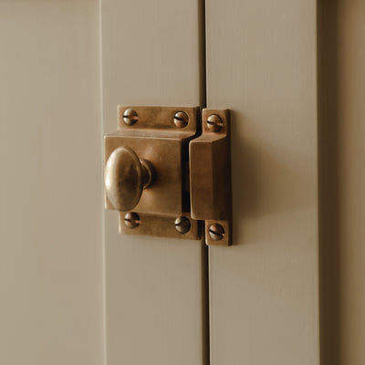 Project by House Nine Design | Photography by Joey Kendal Brown | Cotswold Cupboard Latch shown in our aged brass (BEL) finish.