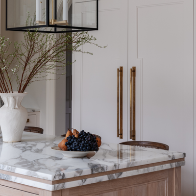 Design by JK Interior Living. Product shown in our aged brass (BEL) finish.