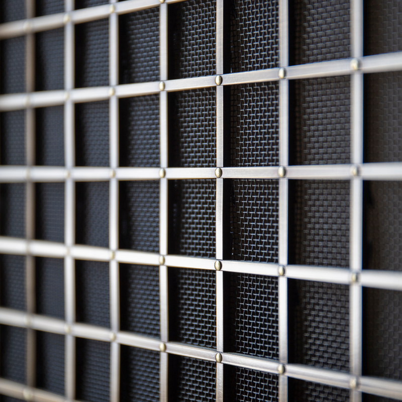 Features our 38mm Georgian Square Grille  with Coarse Mesh Backing in our antique brass lacquered (ABL) grille finish | Project by Jean Stoffer Design | Photography by John Stoffer.