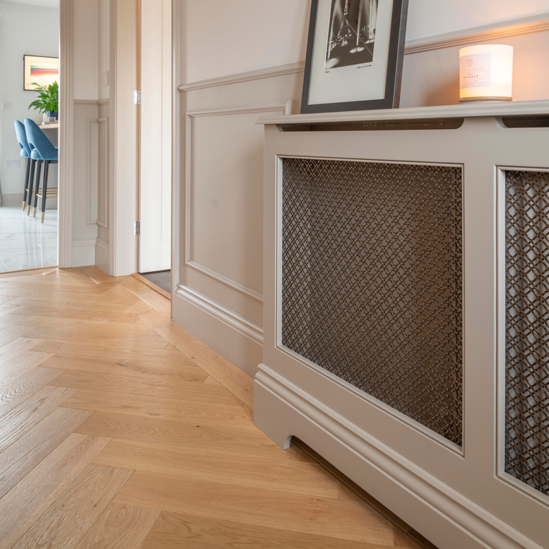 Features our 19mm Double Diamond Interwoven Grille with 3mm Plain Wire in our antique brass lacquered (ABL) grille finish | Project by Anthony Lewis.