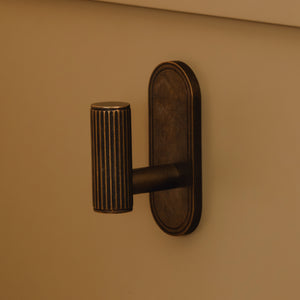Photography by Joey Kendal Brown | Barwick Ridged Wall Hook shown in our dark aged brass (DAB) finish.