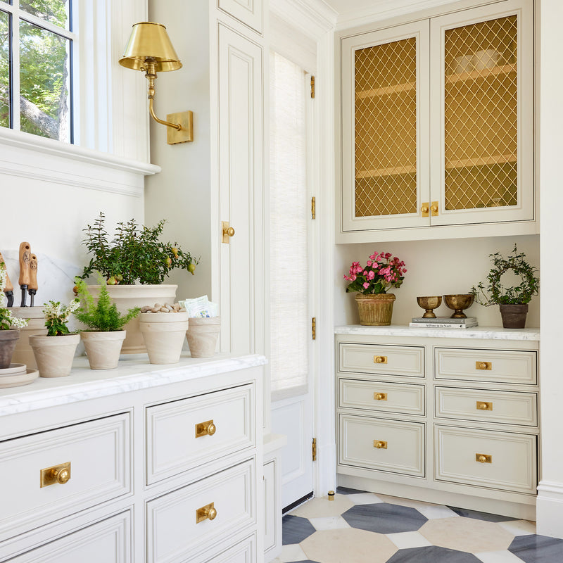 Features our Medium Regency Diamond Grille with Alternating Floral Rosettes and Fine Mesh Backing in our satin brass unlacquered (SBUL) grille finish | Project by Caitlin Wilson Design | Photography by Katie Nixon.