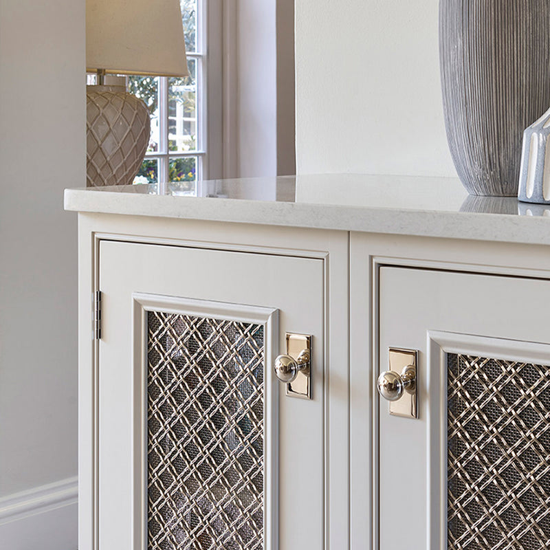 Features our 25mm Double Diamond Interwoven Grille with 3mm Plain Wire and Coarse Mesh Backing in our polished nickel plate (PNP) grille finish | Project by Cooks & Company | Photography by Charles Yorke.