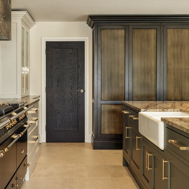 Features our Horizontal Perforated Honeycomb Grille in our satin brass unlacquered (SBUL) grille finish | Project by Brownlow Furniture. 