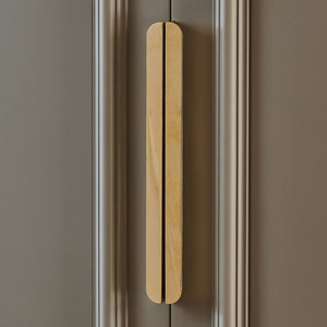 Design by Naked Kitchens | Edgbaston Curved Pull Handles shown in our polished brass unlacquered (PBUL) finish.