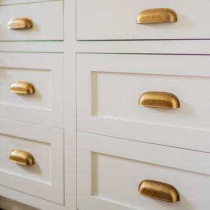 Project by KLO Interiors | Photography by Kelli Boyd | Withenshaw Cup Pulls shown in our aged brass (BEL) finish. 