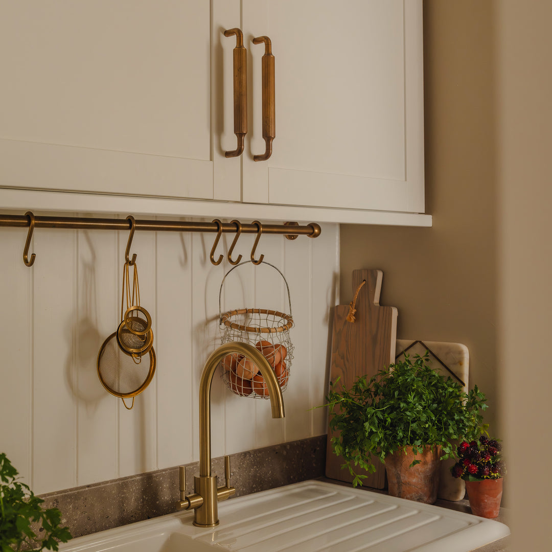 Project by Brett Calvert-Harrison | Photography by Joey Kendal Brown | Cotswold Pot Rail and Barwick Ridged Cabinet Pull Handles shown in our aged brass (BEL) finish.