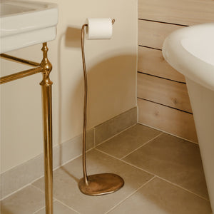 Photography by Joey Kendal Brown | Sketch Freestanding Toilet Roll Holder shown in burnished bronze. 