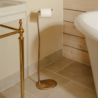Photography by Joey Kendal Brown | Sketch Freestanding Toilet Roll Holder shown in burnished bronze. 
