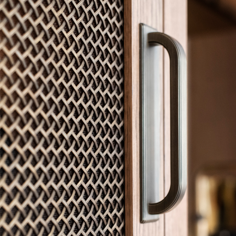 Features our 10mm Diamond Interwoven Grille with 3mm Plain Wire and Coarse Mesh Backing in our antique brass lacquered (ABL) grille finish | Project by Brownlow Furniture | Photography by Mark Reeves. 